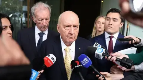 Sex Abuse Accusations Targeting Top Aussie Media Personality Lessened